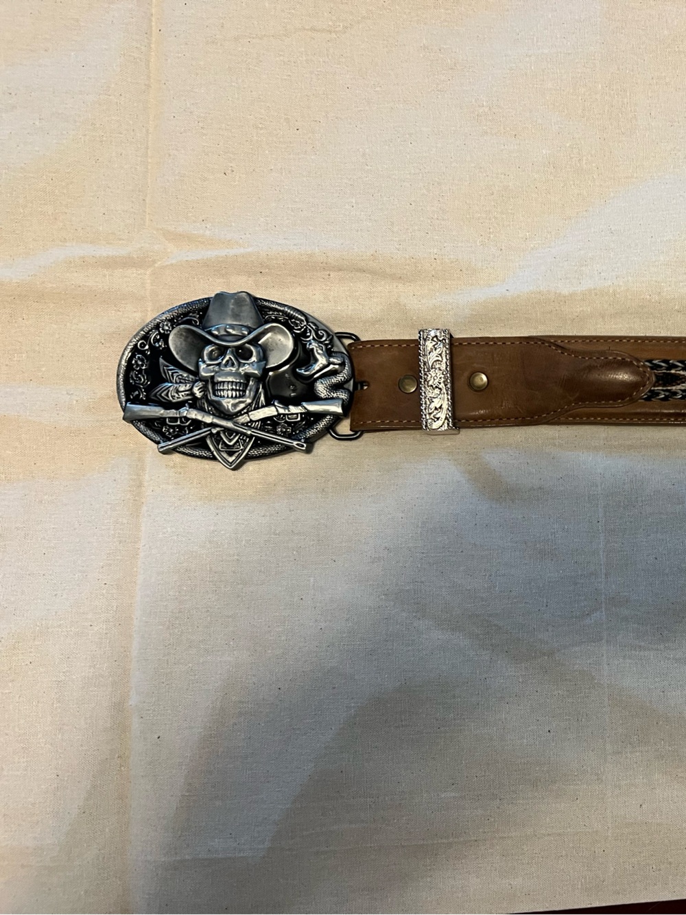 Nocona Brown Leather Western Belt with western gunfighter skull buckle.